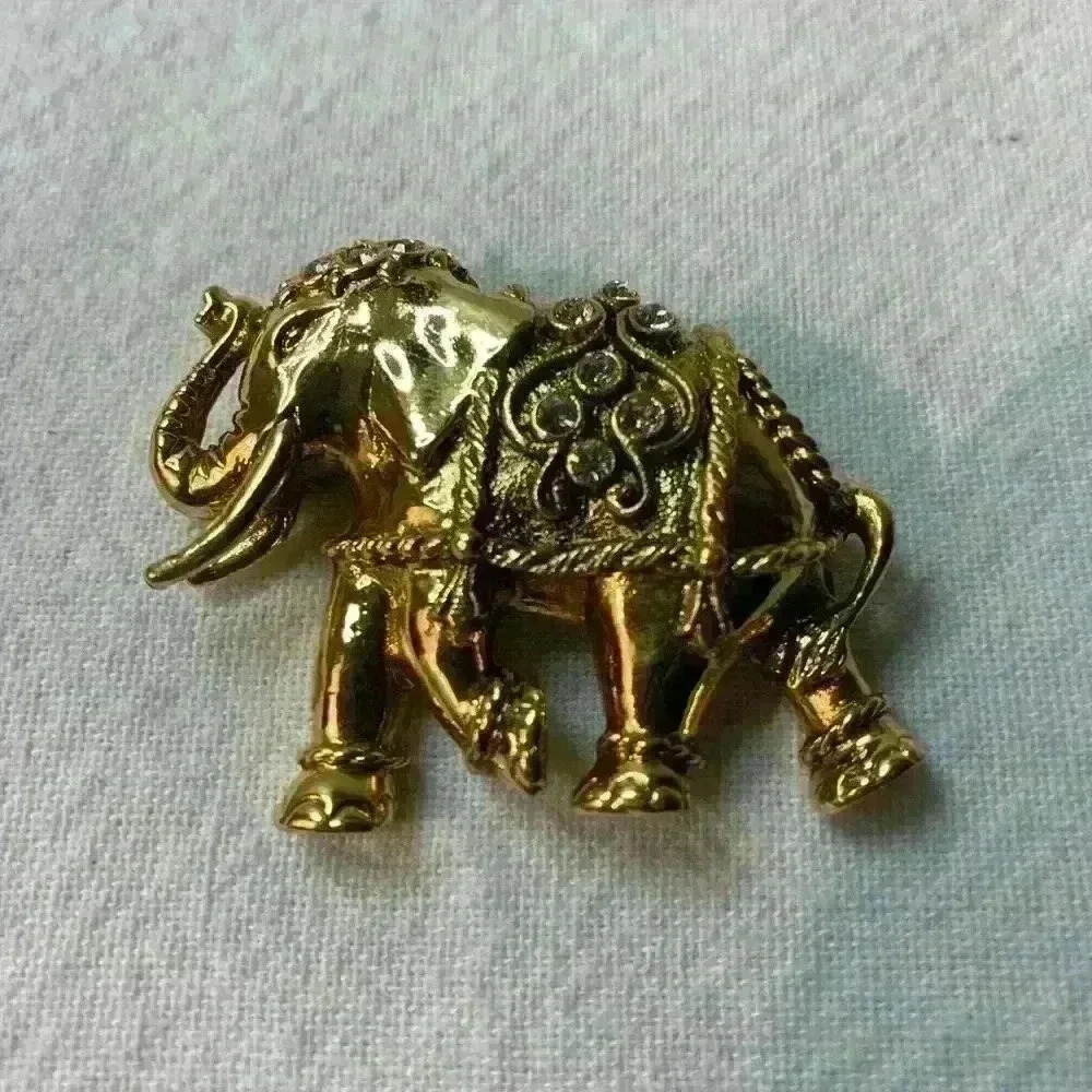 Vintage elephant, brooch, gold with bezel set rhinestones